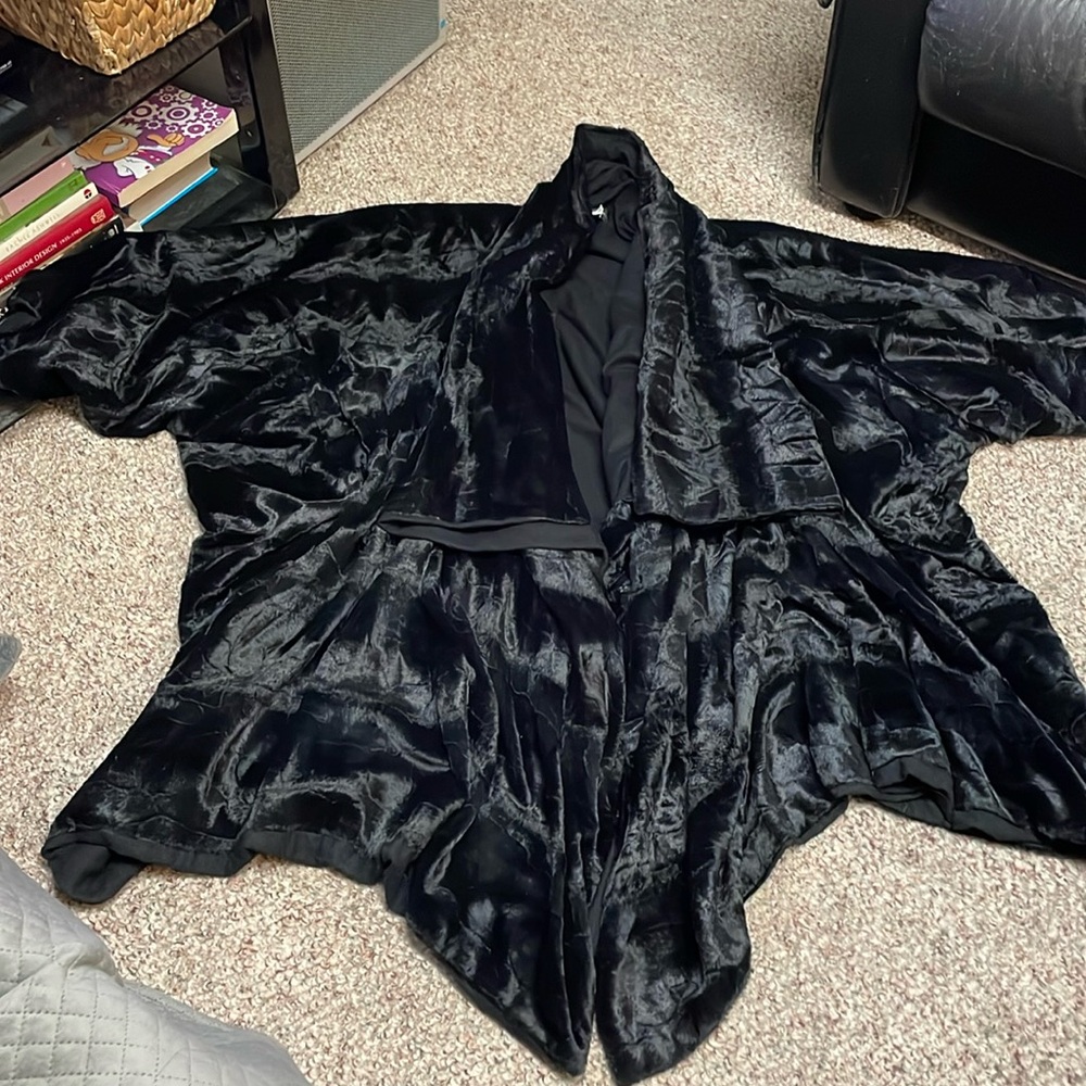 Oversized faux fur cape coat with wool cashmere lining